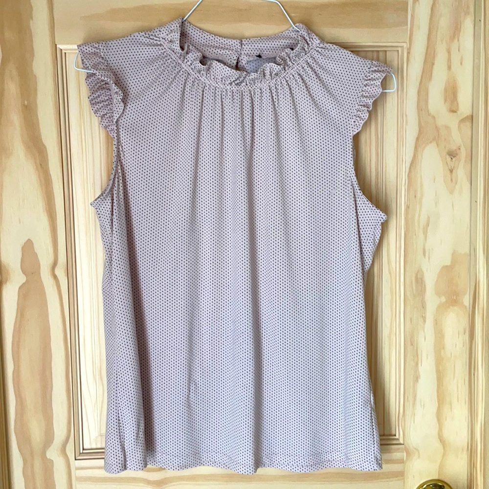 Polka dot pink and black top.